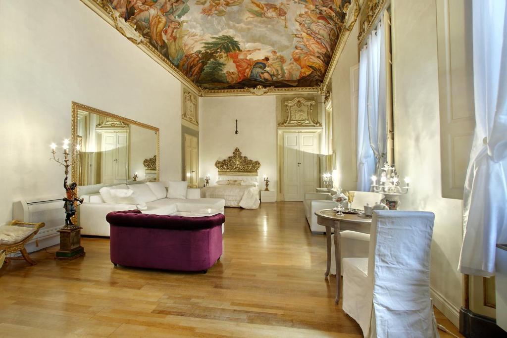 Palazzo Tolomei - Residenza D'epoca Couette-café